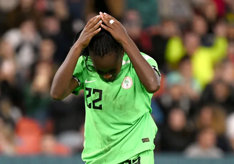 Nigeria’s Michelle Alozie looks dejected after missing a penalty [Dan Peled/Reuters]